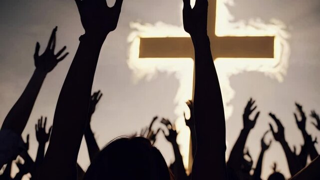 Silhouetted hands raised in worship against a glowing cross, captured from a low angle. The video conveys a spiritual and uplifting atmosphere.