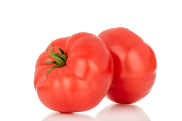 Two pink tomatoes, macro, isolated on white background.