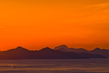 Colortul sunset in the sea and hills on the islands in Dubrovnik