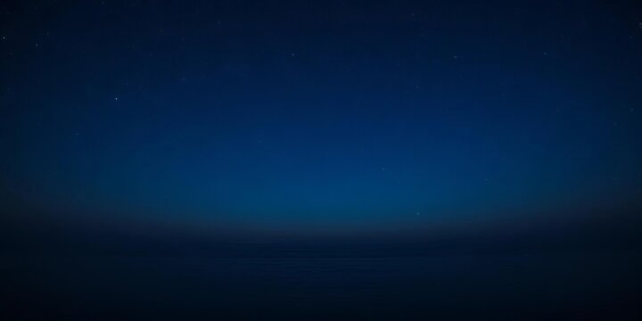 Vast blue night sky, stars above calm ocean Ample copy space, horizon, landscape