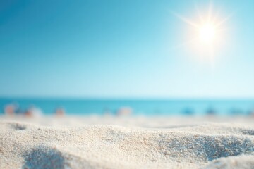 beach scene with bright sunlit sand featuring sunbathers blurred in distance minimalistic setup
