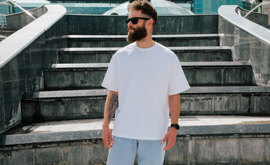 White T-shirt on a bearded hipster in sunglasses — urban mockup for brands