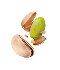 Whole and crushed pistachios close-up on white background in the air