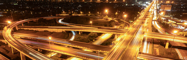 Fototapeta na wymiar Expressway, Self-driving autonomous electric cars of the future with HUD elements move along a busy traffic intersection. Concept: Artificial Intelligence, Car Scan, GPS Tracking, Smart Roads, IoT
