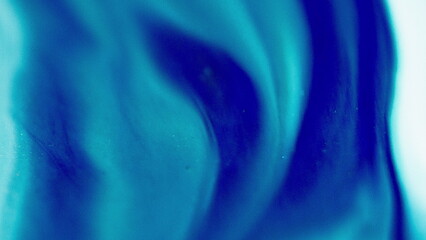 Defocused fluid mix. Water wave. Blur blue white color gradient acrylic ink blend flow reveal motion abstract art background.