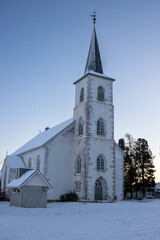 White church and country with snow, Ibestad, Norway