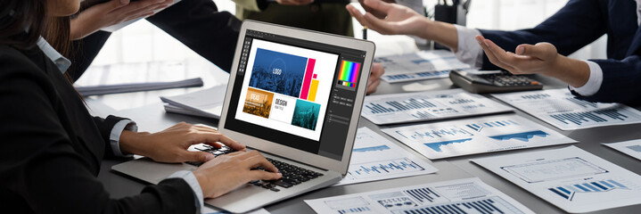 Graphic designer software for modern design of web page and commercial brisk ads showing on the...