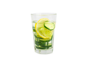 Cucumber water with lemon, lime and mint isolated on white background. Water infused with sliced ​​cucumber in a drinking glass. Tonic refreshing drink. Cucumber lemonade.Summer natural cooling drink