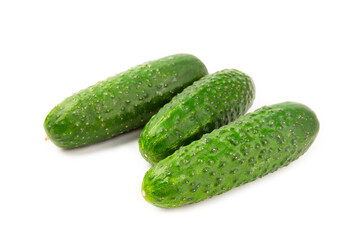 Cucumber isolated on white background. Slice of cucumber on white background. Fresh organic green cucumbers. Vegan. Ingredient for salad. Farm vegetables.