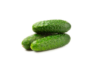 Cucumber isolated on white background. Slice of cucumber on white background. Fresh organic green cucumbers. Vegan. Ingredient for salad. Farm vegetables.