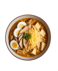 Delicious bowl of flavorful Asian noodle soup topped with sliced chicken, soft boiled eggs, tofu cubes, grated cheese, and fresh cilantro garnish