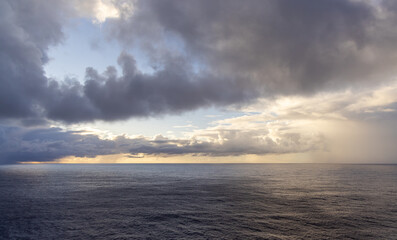 Dramatic Sky Over the Calm Pacific Ocean During Sunset