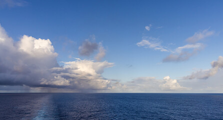 Scenic Ocean View Featuring Blue Sky and Clouds in Pacific Serenity