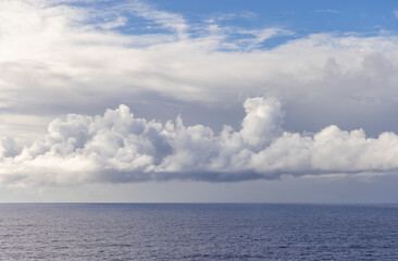 Serene Cloudscape Above the Tranquil Waters of the Pacific Ocean