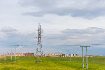 High voltage power lines in the field in Setif City, Algeria.