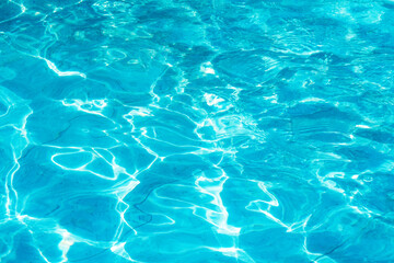 texture of blue water of swimming pool or sea near paradise island.