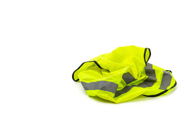 Crumpled reflective vest on a white background. Space for text.