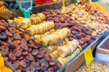 Assorted dried fruits for sale at a shop in the market