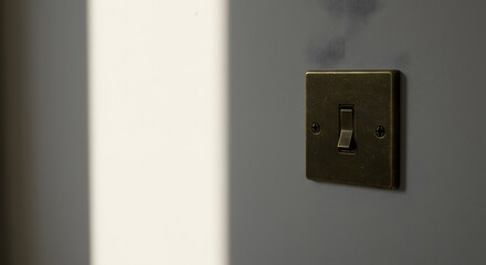 Close up of vintage light switch on wall for energy saving home improvement and electrical projects