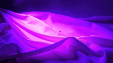Soft fabric waves illuminated by ethereal purple light create a dreamlike atmosphere in a serene space