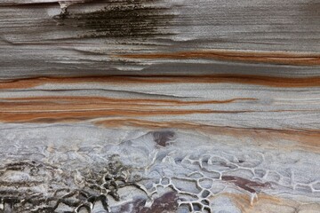 Natural sandstone texture with intricate layers, swirls, and patterns in warm earth tones. Perfect...