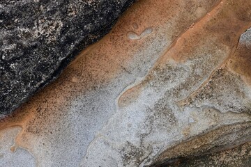 Natural sandstone texture with intricate layers, swirls, and patterns in warm earth tones. Perfect...