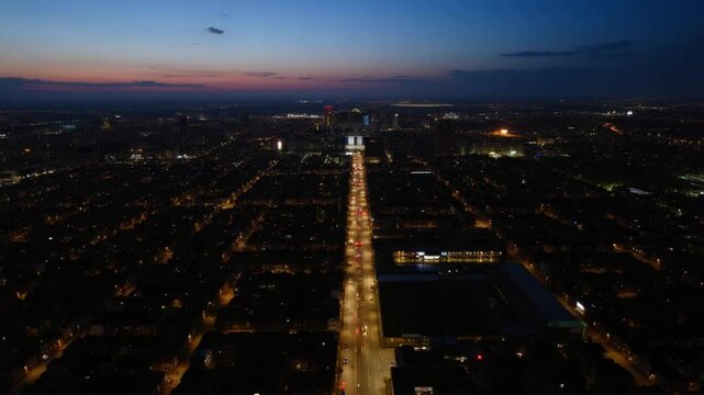 Aerial Footage of British Illuminated Luton Town at Just After Sunset during Night. The Footage Captured on September 1st, 2023 with Drone's Camera. Luton, England United Kingdom