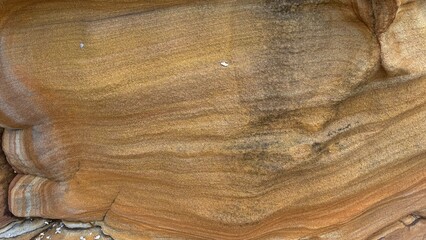 Natural sandstone texture with intricate layers, swirls, and patterns in warm earth tones. Perfect...