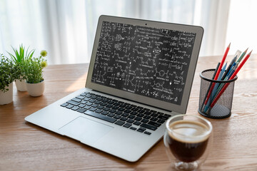 Mathematic equations and modish formula on computer screen showing concept of science and education