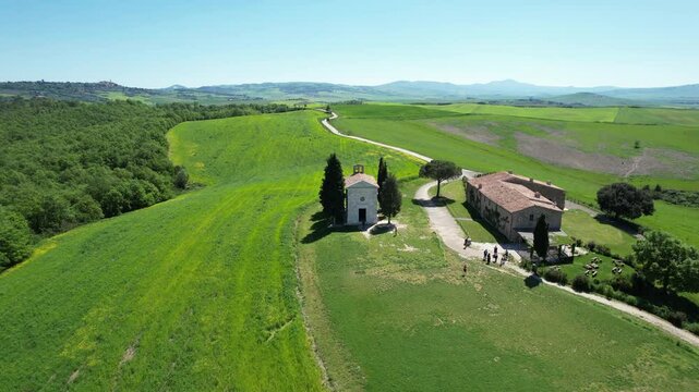 Vitaleta Chapel aerial view in the wonderful valley of D'orcia in Tuscany. Drone footage.