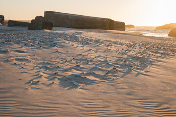 bunkers in denmark from world war II in the evening light