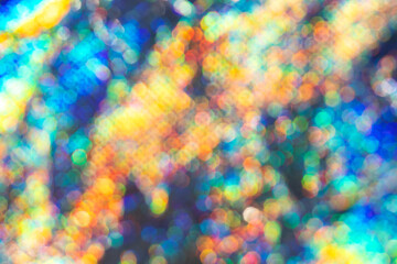 Abstract colorful bokeh background with vibrant and shimmering lights