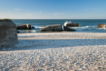 bunkers in denmark from world war II in the evening light