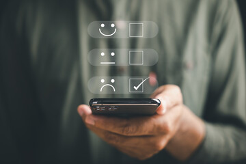 Unhappy client concept. Person holding smartphone showing one star rating. Expressing...