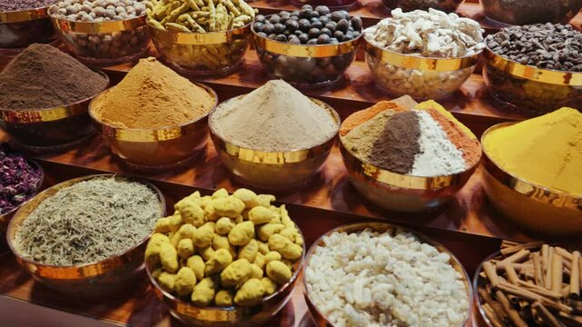 Different spices at display in shops of spices market Dubai UAE