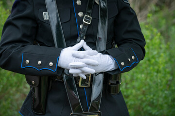 Color guard wearing white gloves
