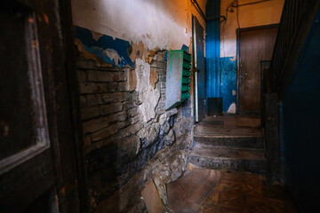 Old abandoned two-story brick house.