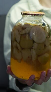 Fruit juice in a transparent jar close-up.
Pear and apple drink.
Apple fresh juice in a bottle.
Cool natural drink with organic and healthy fruits