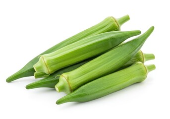 Pile of fresh green okra pods isolated on a white background
