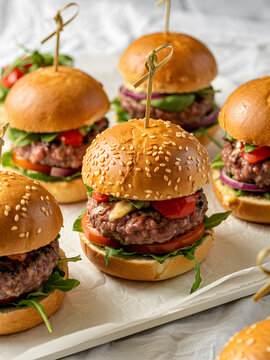 https://chatgpt.com/c/681cfb94-5de4-8007-9325-37dd15b9c6df#:~:text=Close%2DUp%20of%20Gourmet%20Mini%20Burgers%20on%20a%20White%20Serving%20Platter%20with%20Fresh%20Ingredients