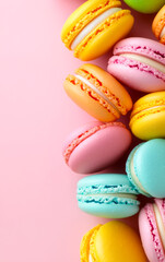 Fototapeta premium Colorful macarons on a pink background. Delicious macarons in various colors arranged on a soft pink background create a vibrant and inviting display.