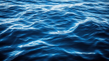 Glimmering Deep Blue Water Surface With Gentle Wavy Patterns