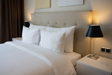 Comfortable Hotel Room with King Size Bed and Soft Pillows Inviting Guests for Relaxing Stay