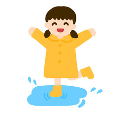 水たまりで遊ぶ女の子