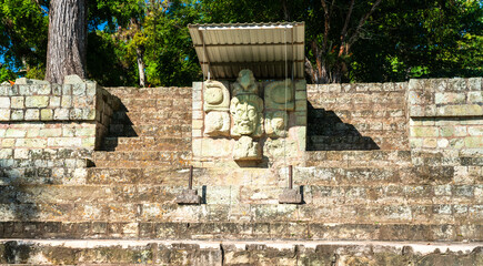 Carved Maya Deity on Temple Stairway in the Archaeological Site of Copan. UNESCO world heritage in Honduras