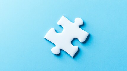 Obraz premium A single, isolated white puzzle piece rests on a vibrant blue background.