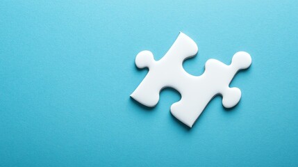 Obraz premium A single, isolated blue puzzle piece rests on a solid blue background.