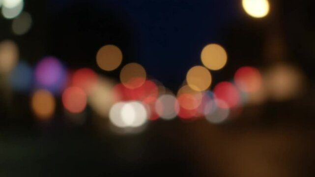 Blur street bokeh with colorful lights in night time