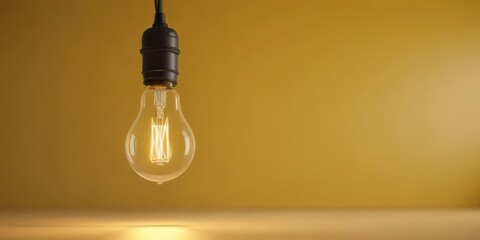 Bright yellow background features a single dangling light bulb ,  illumination,  light,  clean background