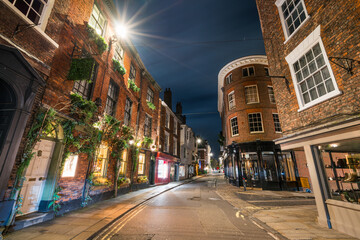 Shambles alley at night in York city. England